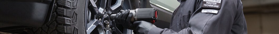 Mechanic working on tire and wheels